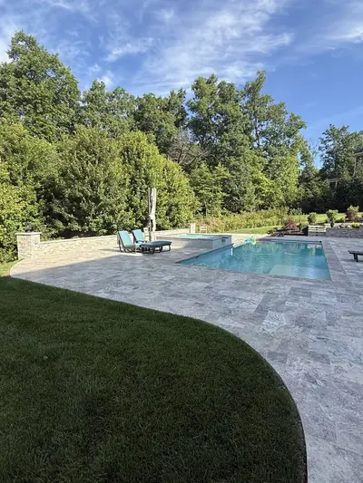 Patio and pool, side angle โ Great Falls, VA porcelain patio